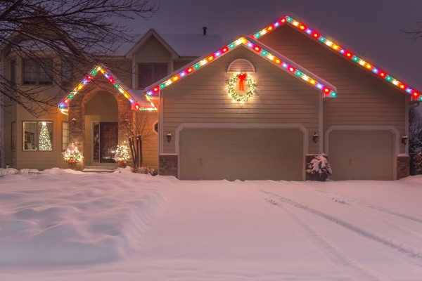 Winter Home with Holiday Lights and Tracks